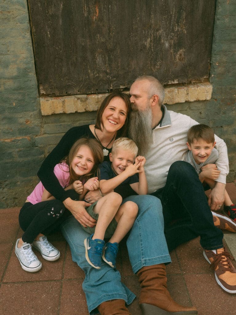 snuggly family shot in downtown acworth